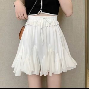 White pleaded short with shorts Size S-M.